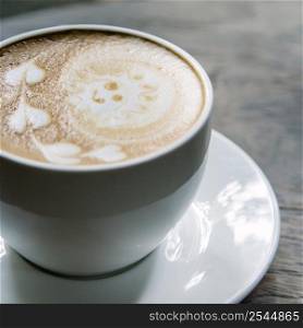 latte coffee on wood table