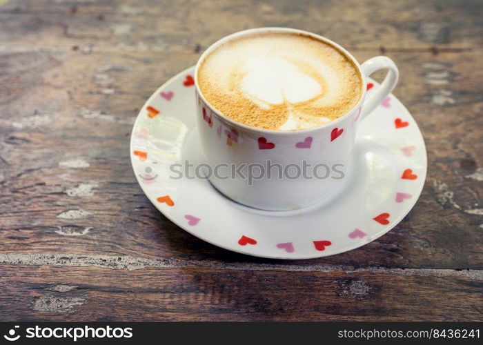 latte coffee on wood table with space