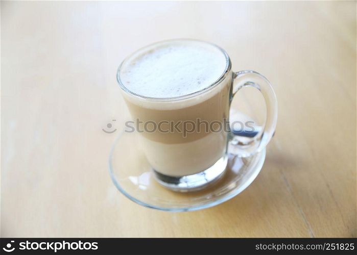 latte hot coffee on wood background