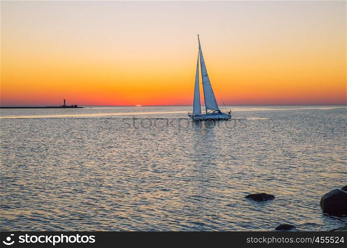 Latvia, Riga, Baltic sea, sunset, mole and wave, yacht. 2017