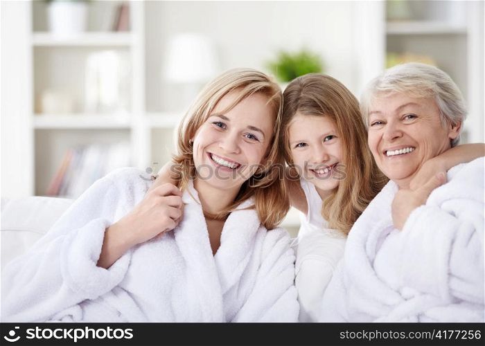 Laughing attractive family at home