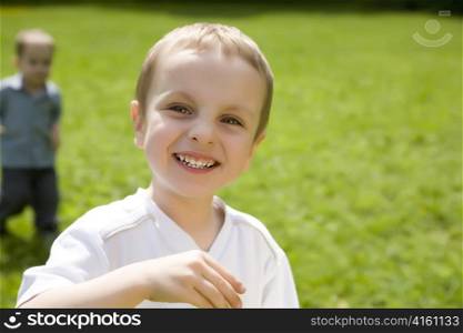 Laughing Boy On The Nature Background