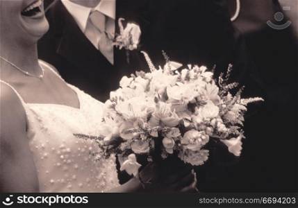 Laughing Bride with Bouquet