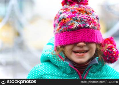 laughing girl in a hat