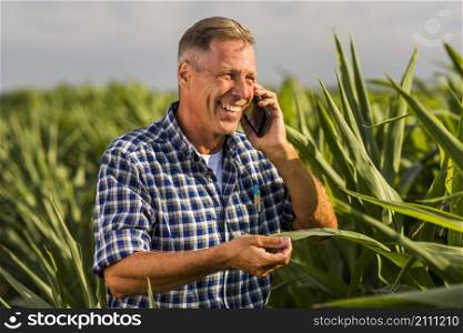 laughing man talking phone