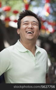 Laughing Mid Adult Man in Nanluoguxiang, Beijing