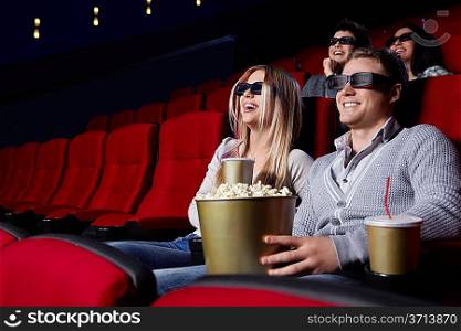 Laughing people at the cinema