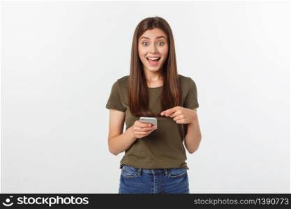 Laughing woman talking and texting on the phone isolated on a white background. Laughing woman talking and texting on the phone isolated on a white background.