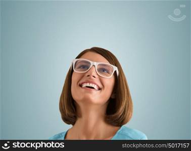 Laughing woman with good sense of humor smiling as she tilts her head back to look into the air