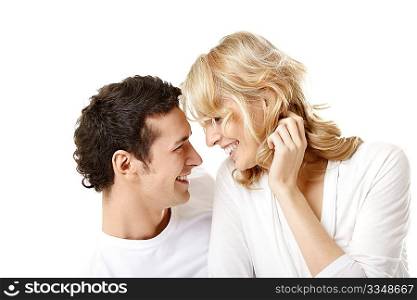 Laughing young couple on a white background