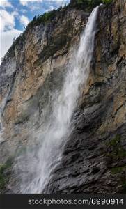 Lauterbrunnen Staubbach Waterfall in summer mountain (Switzerland)