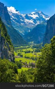Lauterbrunnen valley, village of Lauterbrunnen, waterfalls and the Lauterbrunnen Wall in Swiss Alps, Switzerland.. Mountain village Lauterbrunnen, Switzerland