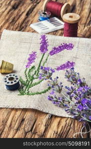 Lavender bouquet embroidery. Embroidery bouquet of lavender and tools of needlework