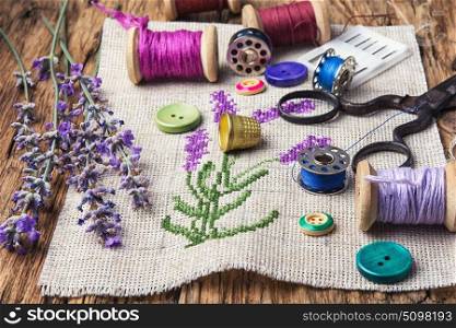 Lavender bouquet embroidery. Embroidery bouquet of lavender and tools of needlework