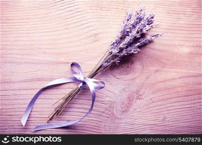 Lavender bunch on the wooden table closeup