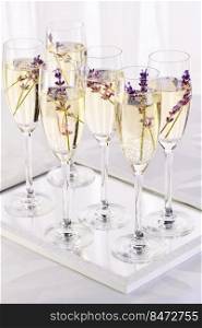 Lavender mood. Ch&agne with soft gentle notes of lavender. Drink for a wedding dinner. Wedding theme ideas.