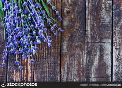 lavender on a table, flowers on the wooden background