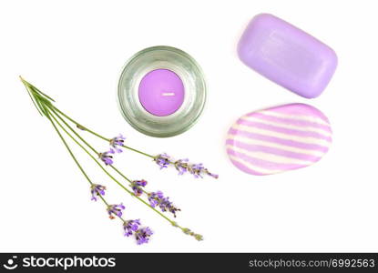 Lavender soap and scented candle isolated on white background. Skin care products. Flat lay,top view.