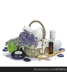 lavender spa (fresh lavender flowers in a basket, essential oil, salt, Herbal massage balls, zen stones) over white
