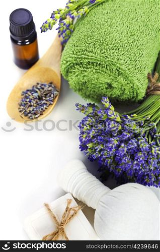 lavender spa (fresh lavender flowers, towel, essential oil, Herbal massage balls) over white