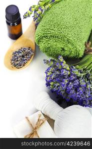 lavender spa (fresh lavender flowers, towel, essential oil, Herbal massage balls) over white