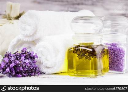 Lavender spa with essensial oil and white towels