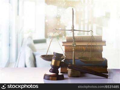 Law and justice concept - law gavel with scale and row of books on white abstract background. Law and justice concept. Law and justice concept