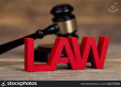 Law and justice concept, wooden gavel. Law theme, mallet of the judge, justice scale, wooden desk background