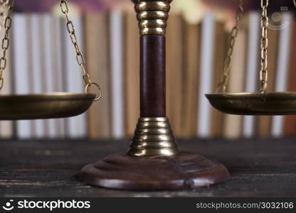 Law book, mallet of the judge, justice scale, wooden desk backgr. Law and justice concept, legal code and scales