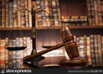 Law books, mallet of the judge, Courtroom background. Judge gavel and scales of justice and book background