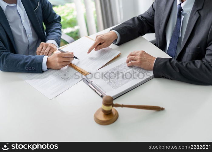 law concept The entrepreneur who wears the black suit trying to ask the lawyer to clarify the legislation that seems to confuse him.