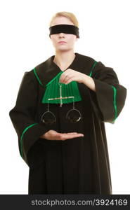 Law court concept. Woman lawyer wearing classic polish black green gown with covered eyes holds scales. Femida - symbol sign of justice. isolated on white