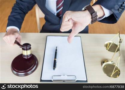Law court or justice concept. Portrait lawyer making thumb down hand.