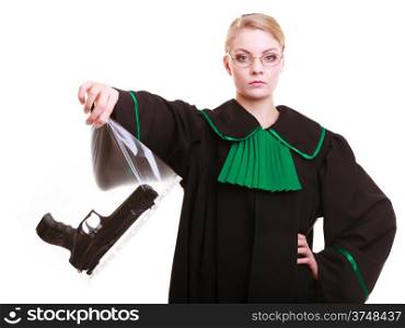 Law court or justice concept. Woman lawyer attorney wearing classic polish (Poland) black green gown with weapon gun - bag marked evidence for crime. isolated on white background.