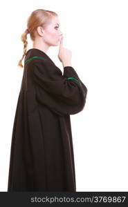 Law court or justice concept. Womn lawyer attorney wearing classic polish (Poland) black green gown asking for silence isolated. Finger on lips as quiet sign symbol gesture hand.