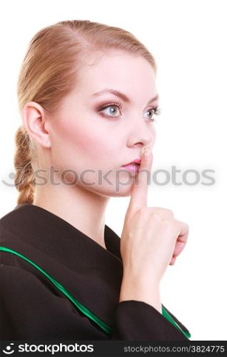Law court or justice concept. Womn lawyer attorney wearing classic polish (Poland) black green gown asking for silence isolated. Finger on lips as quiet sign symbol gesture hand.
