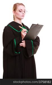 Law court or justice concept. Young woman lawyer attorney wearing classic polish (Poland) black green gown holding writing takes notes on clipboard. Isolated on white background