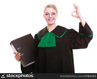 Law court or justice concept. Young woman lawyer attorney wearing classic polish (Poland) black green gown with file folder or dossier ok sign hand gesture isolated on white background