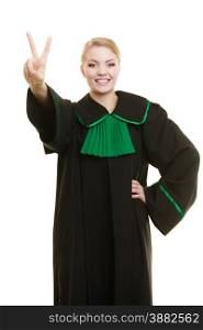 Law court or justice concept. Young woman lawyer attorney wearing classic polish black green gown making ok sign victory hand gesture isolated on white background