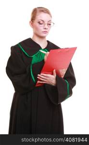 Law court or justice concept. Young woman lawyer attorney wearing classic polish (Poland) black green gown holding writing takes notes on clipboard. Isolated on white background
