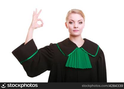 Law court or justice concept. Young woman lawyer attorney wearing classic polish (Poland) black green gown making ok sign hand gesture isolated on white background