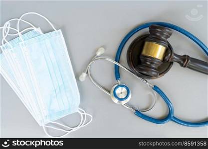 law gavel, stethoscope and face anti virus masks, medical law concept. medical law concept