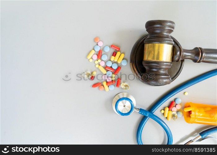 law gavel, stethoscope and pills, medical law concept. medical law concept