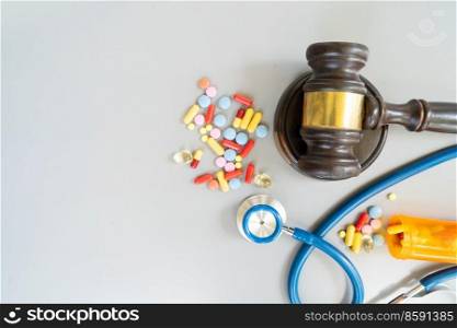law gavel, stethoscope and pills, medical law concept. medical law concept