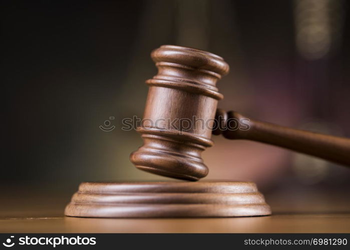 Law theme, mallet of judge, wooden gavel