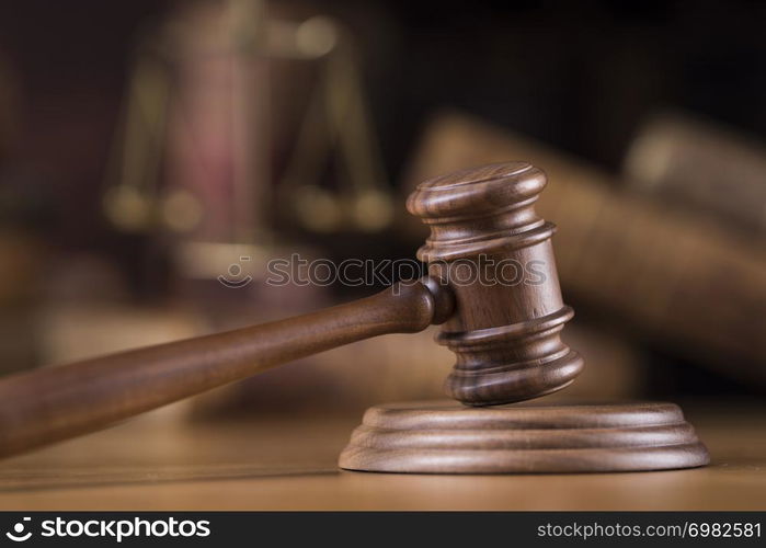 Law theme, mallet of judge, wooden gavel