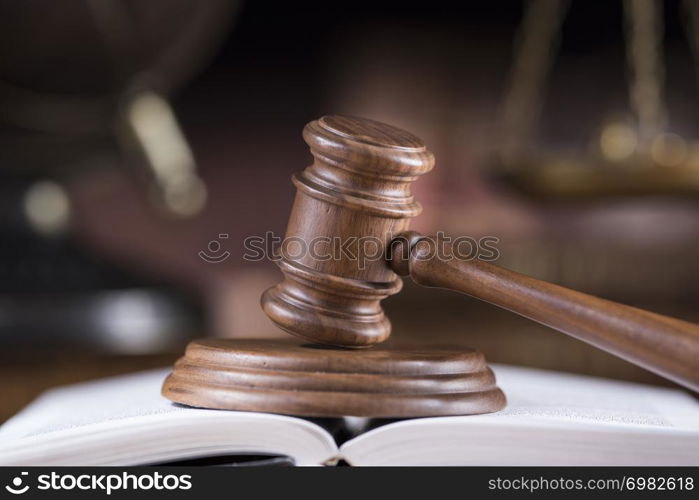 Law theme, mallet of judge, wooden gavel