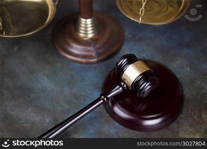 Law theme, mallet of the judge, wooden desk background. Court gavel,Law theme, mallet of judge