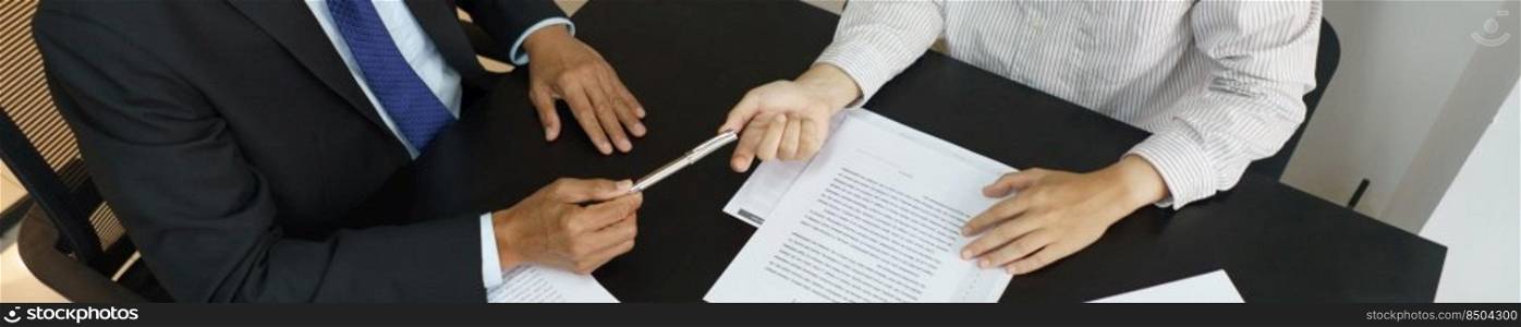 Lawyer and justice concept, Businessman receives a pen from senior lawyer to signing contract.
