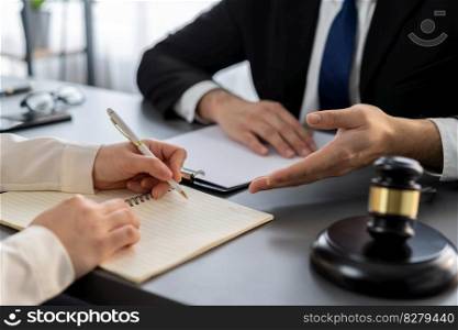 Lawyer colleagues or legal team working or drafting legal document at law firm office desk. Gavel hammer for righteous and equality judgment by lawmaker and attorney. Equilibrium. Lawyer colleagues or legal team working at law firm office desk. Equilibrium